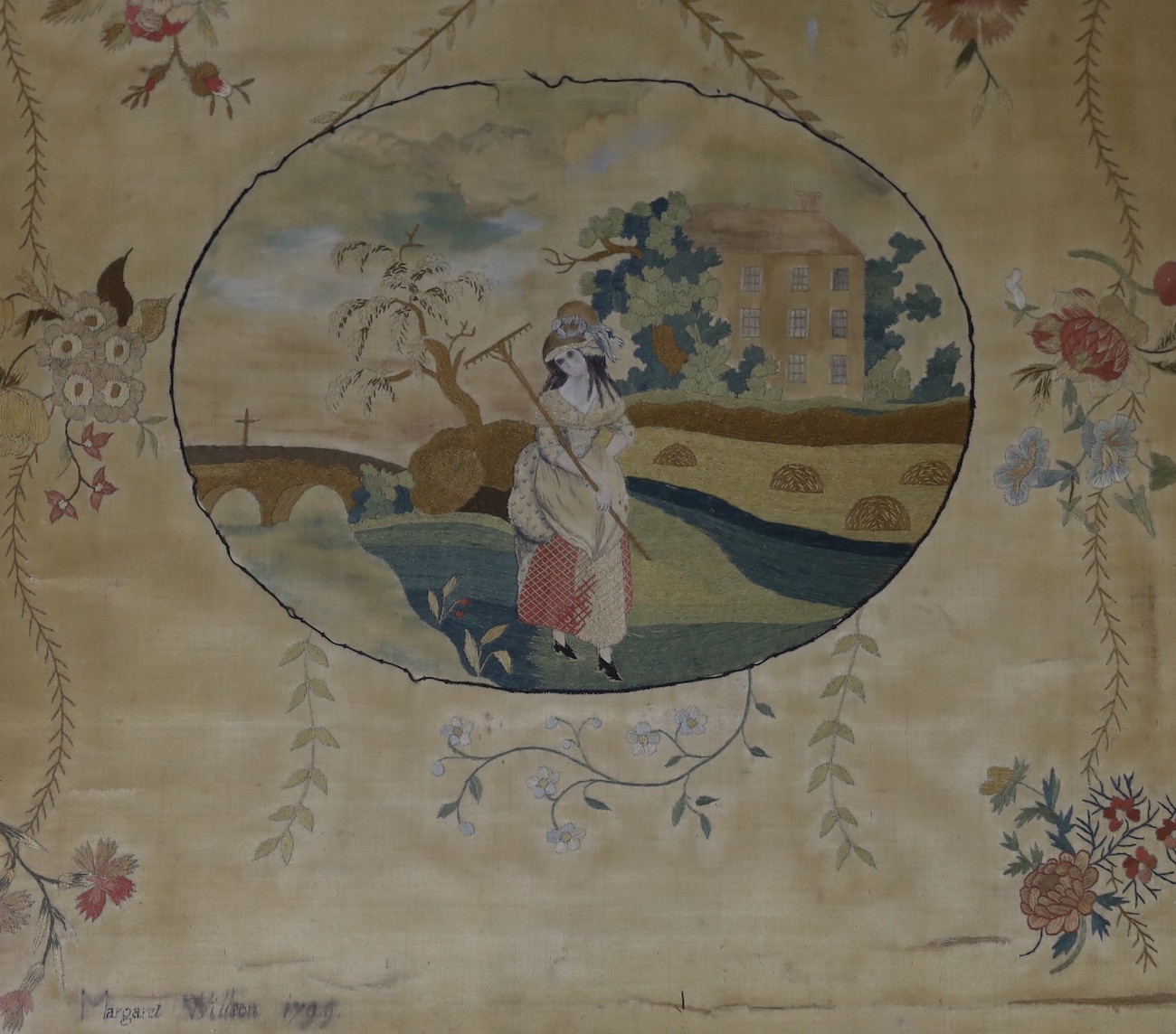 A maple framed George III silk panel of lady in harvest by Margaret Wilson, 1799inscription verso, 37 x 37cm